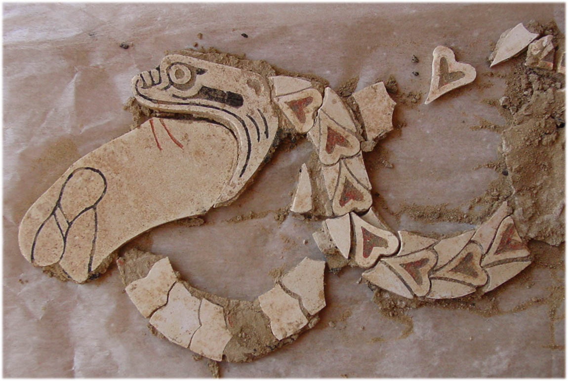 Mosaic of a snake swallowing an object from Central Asia dating to the Bronze Age (2500-1500 BCE)